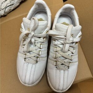 White Sneakers with Gold Accents
